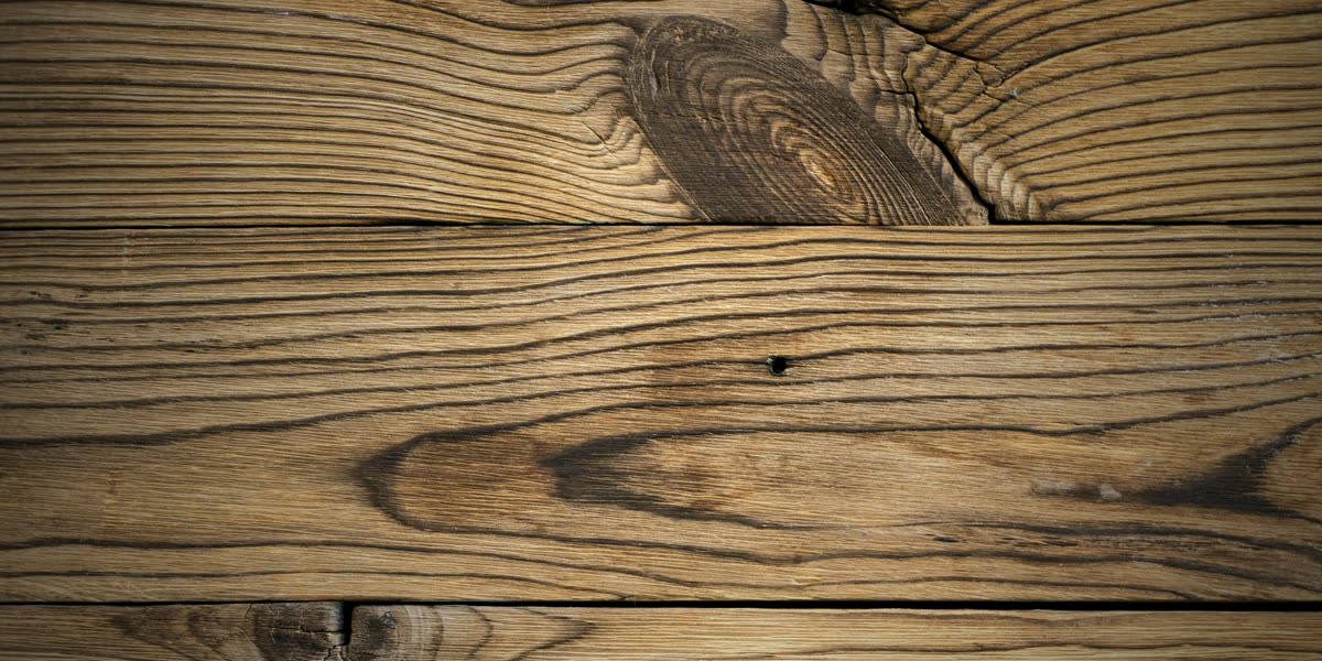 Tablas de madera rústica con vetas y nudos (foto de muestra)